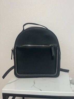 Sleek Black Mini Backpack with Studded Pocket